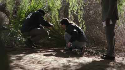 NICOLE: And they started
brushing away the debris, - Buried In The Backyard