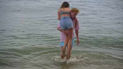 [Nikki] We've arranged for all the  
committed couples to have beach dates - Twin Love
