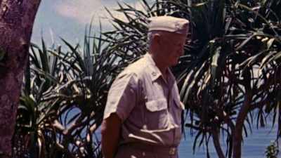 Nimitz is a soft-spoken leader
by example who shuns attention. - The Pacific War in Color