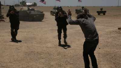 No! Don't shoot! Don't shoot!
I'm unarmed! - Waco