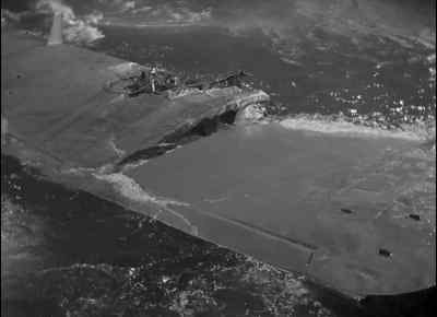 No good staying on here,
she's going under. Quick, onto the wing. - Foreign Correspondent