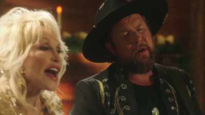 * No I never walk alone never walk alone * - Dolly Parton's Mountain Magic Christmas