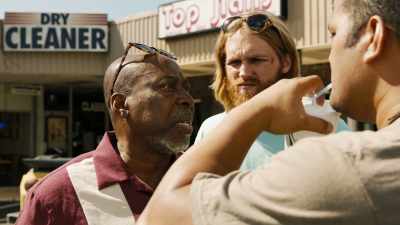 No. No, h-he's
the sign-spinner guy for Burt. - Lodge 49