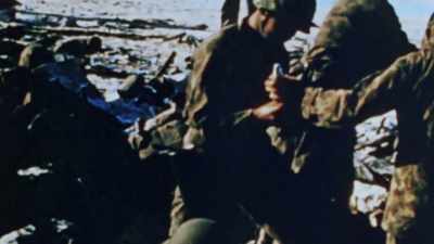 Now Americans turn
their guns back out to sea - The Pacific War in Color