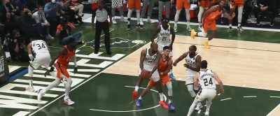Now Booker
throws it up for Ayton. - Giannis: The Marvelous Journey