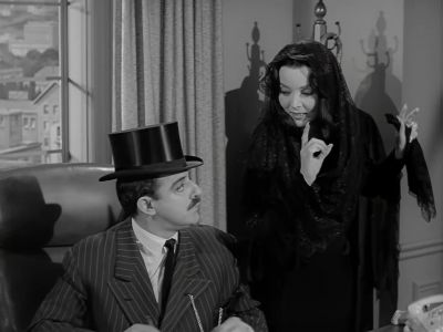 Now, darling, put your hand
up like this and repeat after me. - The Addams Family