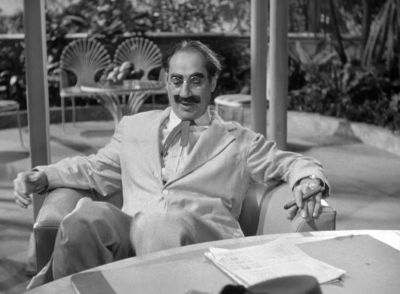 Now gentlemen I'm a different man behind a desk - A Night in Casablanca