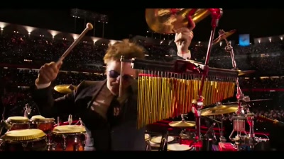 ♪ Now have you ever seen
all the white teeth gleam ♪ - Elton John Live: Farewell from Dodger Stadium