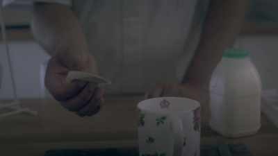 Now, here's a cup,
and here's the tea bag. - Care