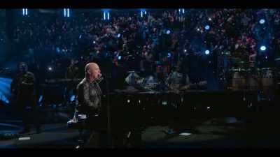 ♪ Now, John at the bar
is a friend of mine ♪ - Billy Joel: The 100th - Live at Madison Square Garden