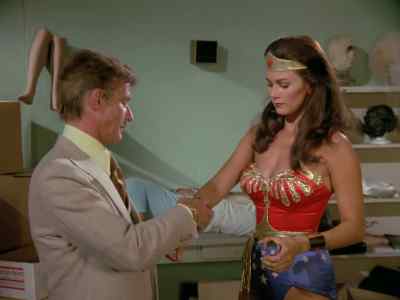 Now, let's see. Hands on your hips, I think. - Wonder Woman