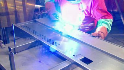 Now they mount the door
in an alignment fixture - How It's Made