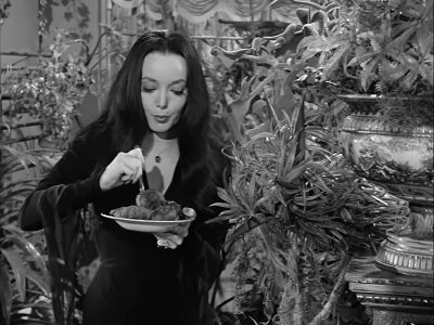 Now, now, CIeopatra, chew your burgers. - The Addams Family
