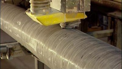 NOW THEY CUT OUT THE HAND HOLE, - How It's Made