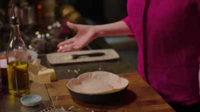 Now it thinks it's a pie, it also thinks a bit
that it might be a pizza so, more cheddar on top. - Nigella: At My Table