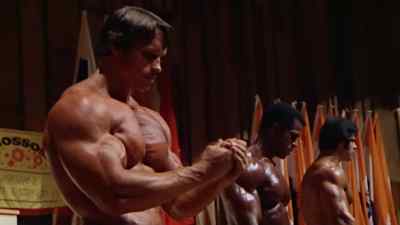 Now we'll call on all three contestants... - Pumping Iron