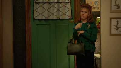Now why would she run out
to gather logs for the fireplace - At Home with Amy Sedaris