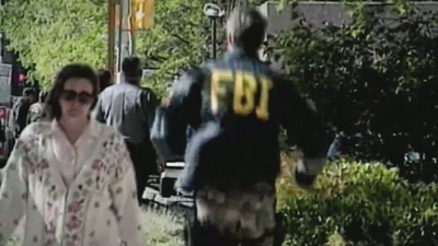 - Now,
with one suspect in jail, - FBI TRUE