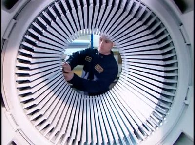 NOW WORKERS TIE THE COILS. - How It's Made