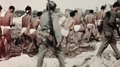 Of 3,500
defenders, only 51 survive. - The Pacific War in Color