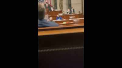 Officer:
Please grab a mask,
place it in your lap, - Four Hours at the Capitol