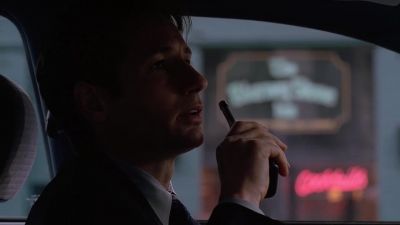 (ofHceo Moving into position
at the back exit. - The X-Files