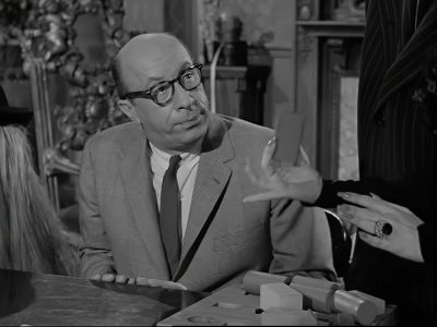 Oh, dear, why don't they give
instructions with these things? - The Addams Family