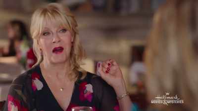 Oh, girls, did you see that video
that Andrea posted - A Zest For Death: A Hannah Swensen Mystery