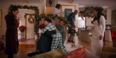 - Oh, my goodness, this
is quite the surprise! - Christmas with a Kiss