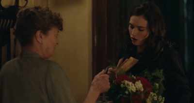 Oh, please keep the flowers
for yourself, Mrs. Burns, - The Guernsey Literary and Potato Peel Pie Society
