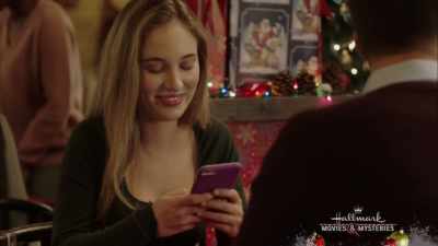- Oh, the sweater,
snowflakes, good joke. - Once Upon a Christmas Miracle