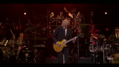 ♪ Oh, there must be shackles on his feet ♪ - Elton John Live: Farewell from Dodger Stadium
