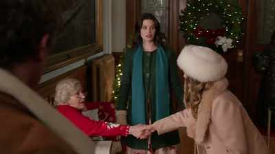 Oh yeah, Scarlet.
Ethan's girlfriend. - Believe in Christmas