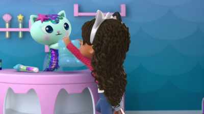 OK, Gabby. Step one: Put these on. - Gabby's Dollhouse