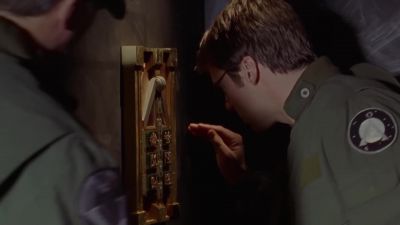 OK, he opened the door
by pressing a combination of... - Stargate SG-1