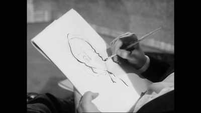 Old-school technique,
dipping into an inkwell. - The Eyes of Orson Welles