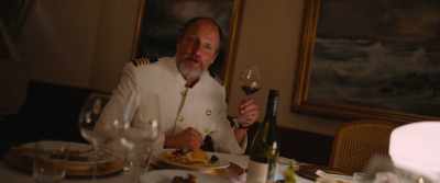 On a $250-million luxury yacht. - Triangle of Sadness