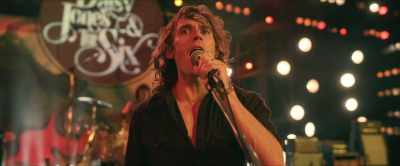 On drums, a man
who keeps time like a Rolex - Daisy Jones & the Six