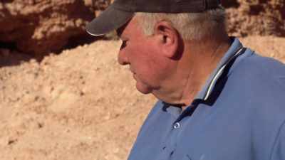 On his neighbouring claim, - Outback Opal Hunters