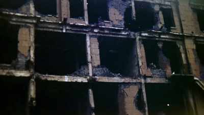 On this pockmarked building, - The Pacific War in Color