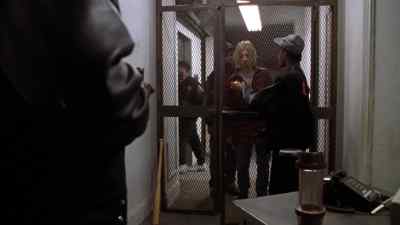 On the 2nd floor, a worker
rings a buzzer and a code. - New Jack City