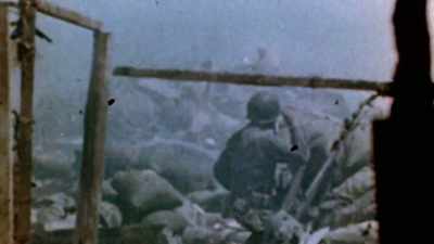 On the beach, the
Japanese continue to hurl - The Pacific War in Color
