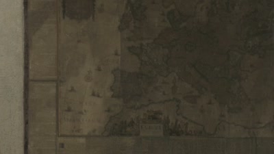 On the wall is a map of Europe, - Vermeer: The Greatest Exhibition