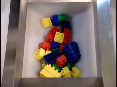 ONCE EACH KIT IS COUNTED,
IT DROPS INTO A BUCKET. - How It's Made