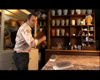 ONCE THE HAIR IS BLENDED,
HE CUTS IT IN TWO. - How It's Made
