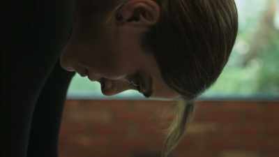 One big hand on her cell phone. - Psycho Yoga Instructor