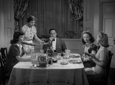 One does not read one's book when one is at the dinner table - Nice Girl?