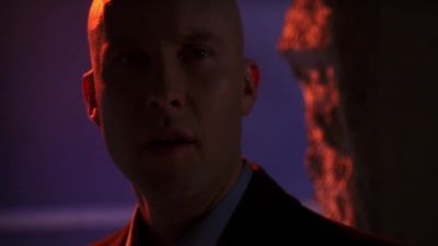 One minute he's standing
in the same room with me... - Smallville
