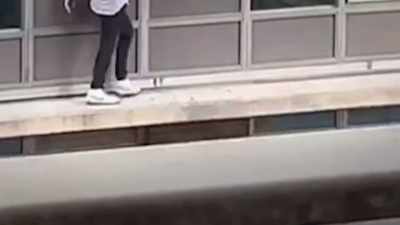 One misstep, and he could plunge
80 feet to his death. - Neighborhood Wars