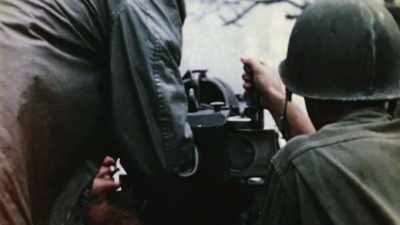 One of the officers
approaching the ridge - The Pacific War in Color